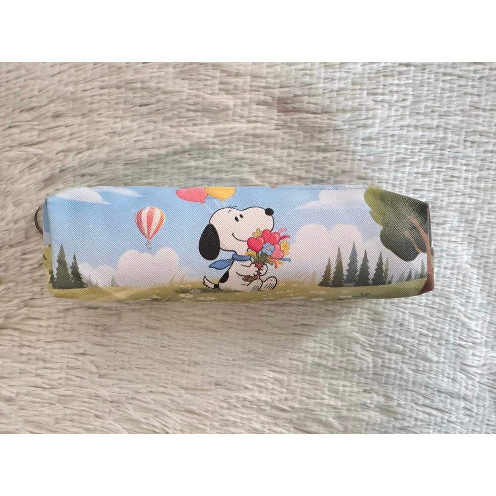 Snoopy pencil case with Snoopy holding balloons and flowers